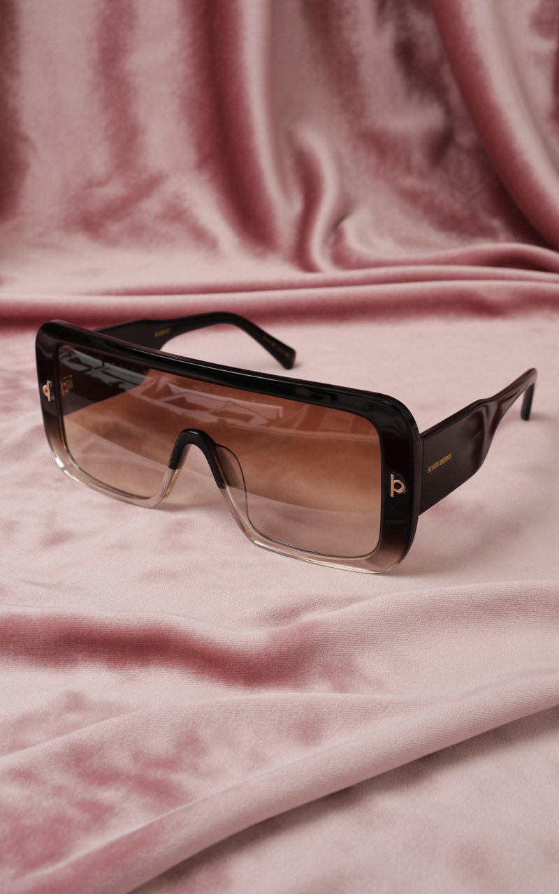 Oversized shield glasses with gradient lenses on velvet fabric